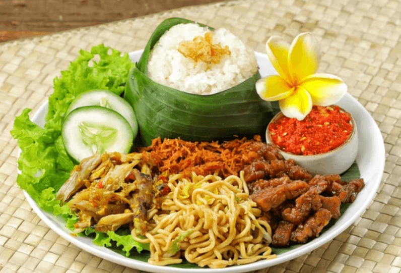 NASI JINGGO SEBAGAI PEMUAS PERUT DAN MAKANAN ANDALAN PERANTAU DI BALI